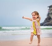 pic for baby playing in beach 